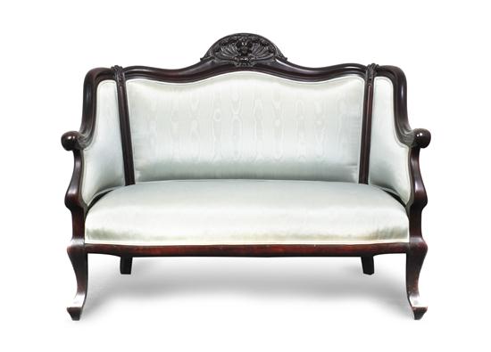 An Empire Revival Settee the crest