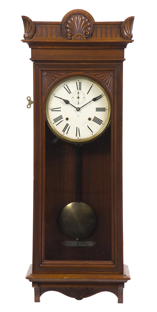 A Victorian Walnut Wall Clock Ansonia