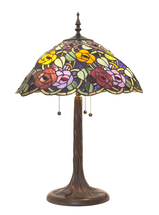 A Leaded Glass Table Lamp having a flowering
