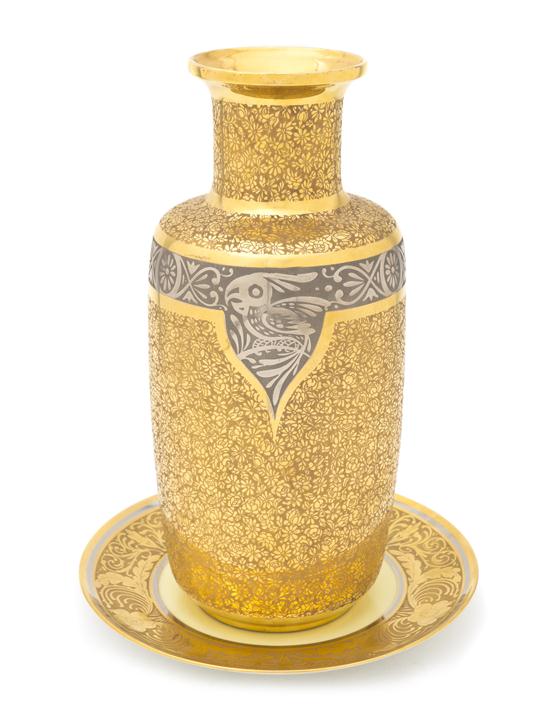 A Porcelain and Metal Inset Vase
