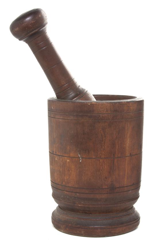 A Primitive Wood Mortar and Pestle the