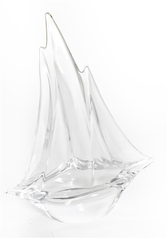 A Daum Glass Sailboat of three