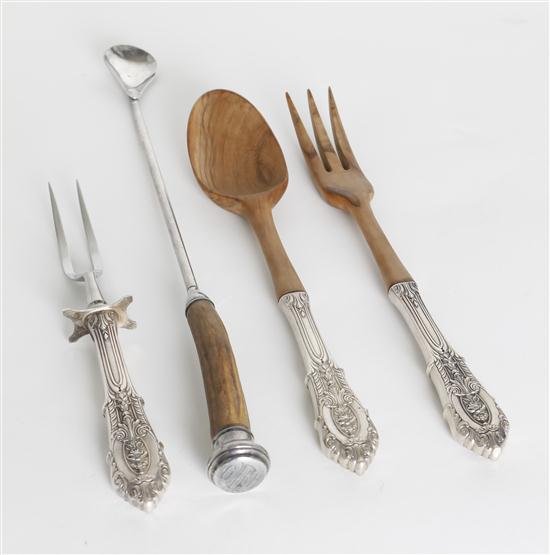 A Set of Four Wood and Silver Servers.