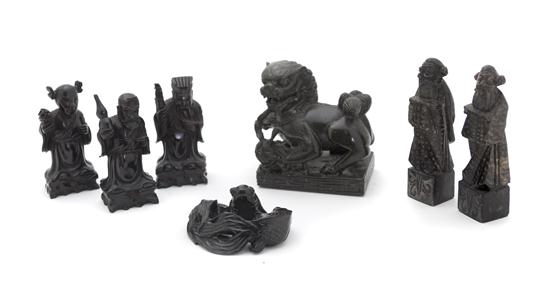 A Collection of Seven Carved Decorative