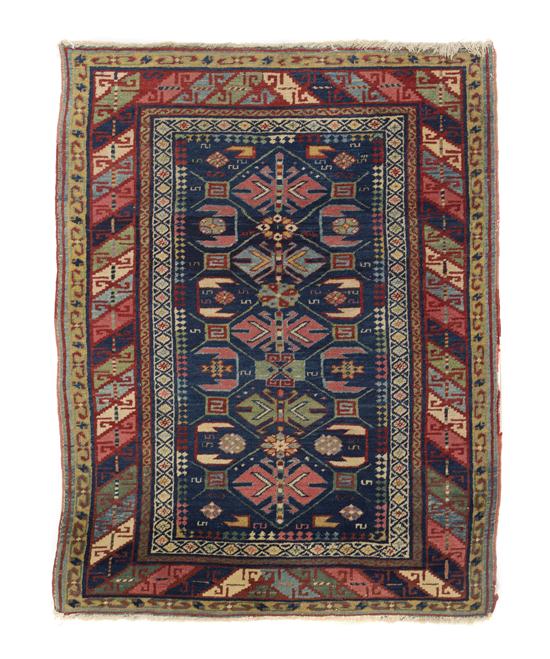 A Persian Wool Rug having repeating 150857