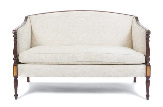 A Sheraton Style Settee having an upholstered