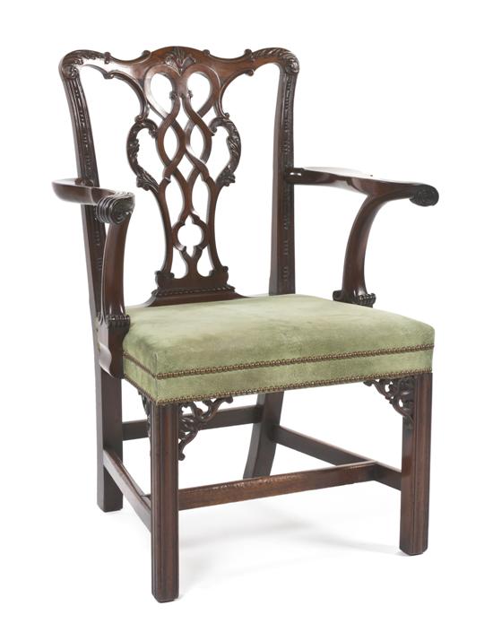 *A George III Mahogany Open Armchair