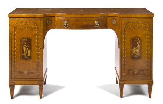 An Edwardian Satinwood Sideboard having