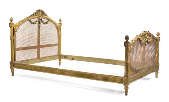 A Louis XVI Style Giltwood Bed