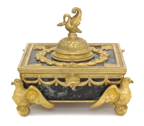 An Empire Style Gilt Bronze and