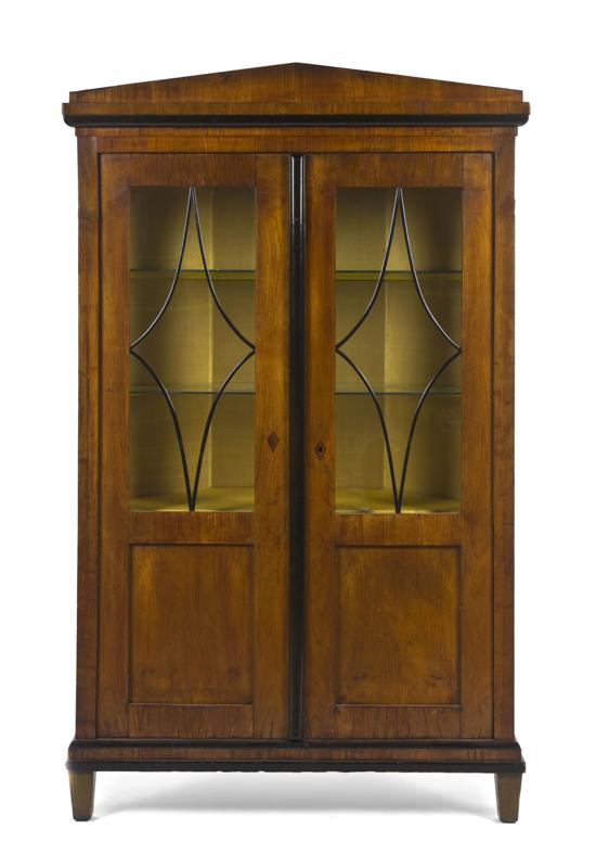  A Biedermeier Corner Cabinet having 150bdf