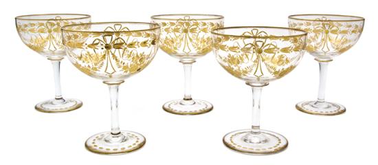 A Set of Eleven Etched Glass Champagne