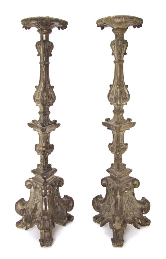 A Pair of Continental Carved Silvered