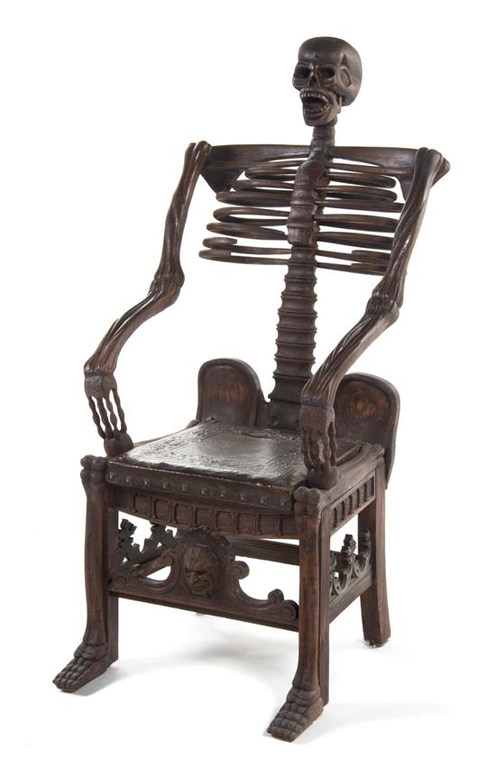 A Carved Pine Skeleton Chair having