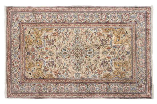 A Silk Prayer Rug having a central