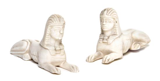 *A Pair of Carved Ivory Sphinxes