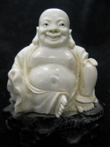 Carved Ivory Figurine of a SeatedBuddha