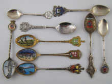 Nine souvenir teaspoons mostly with