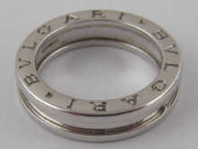 An 18 carat white gold band ring