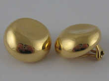 A pair of 18 carat gold ear clips
