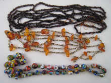 Three necklaces being millefiori glass