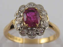 An 18 carat gold ruby and diamond