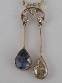 A diamond and blue stone negligee