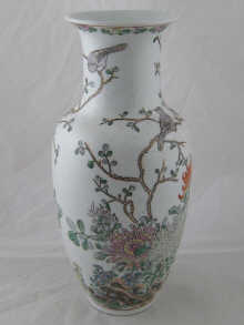 A Chinese ceramic vase with overglaze