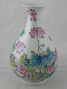 A Chinese ceramic vase with overglaze