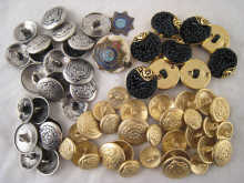 A quantity of buttons including