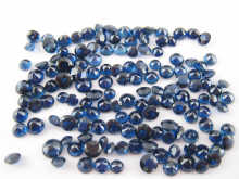 A quantity of loose polished blue