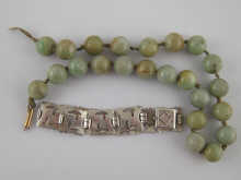 A green hardstone bead necklace