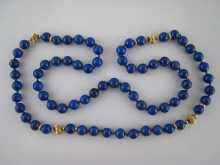 A lapis lazuli bead necklace with 14e960