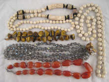 Three bead necklaces together with two