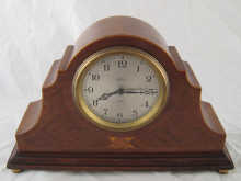 A Smiths 8 day mantel clock in veneered