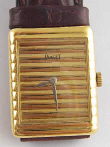 An 18 carat gold wrist watch by 14e97c