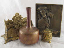 A brass mallet shaped vase ht. 23cm