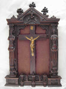 A framed French crucifix the rosewood