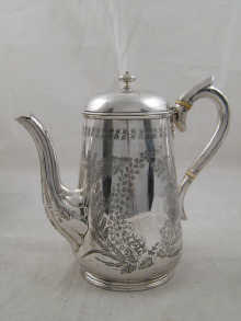 A Victorian silver coffee pot/hot water