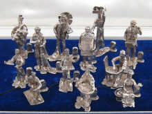 A set of twelve hallmarked silver cast