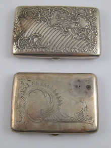 A silver cigarette case with embossed 14e9db