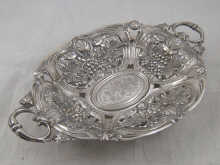 A silver two handled fruit bowl