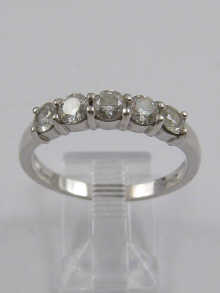 A hallamrked 18 ct white gold ring