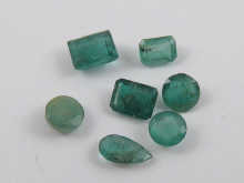 A quantity of loose polished emeralds