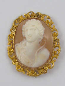 A Victorian carved shell cameo in a