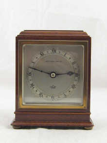 A square faced mahogany clock by 14ea73