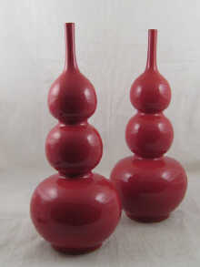 A pair of Chinese vases shaped as three
