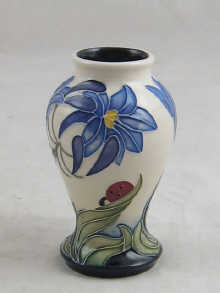 A small Moorcroft vase decorated