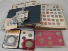 A mixed lot of two albums of stamps 14ea9f