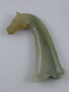 A jade curved dagger handle carved 14eab5